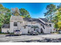 Inviting condo with well-maintained landscaping and ample parking at 4466 Little River Inn Ln. # 906, Little River, SC 29566