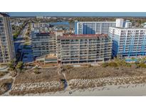 Coastal condo building offering multiple units with stunning ocean views and beach access at 4719 S Ocean Blvd. # 209, North Myrtle Beach, SC 29582