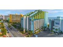 Beautiful ocean-front Monterey Bay Suites resort featuring colorful architecture, on-site parking, and beautiful landscaping at 6804 N Ocean Blvd. # 1639, Myrtle Beach, SC 29572