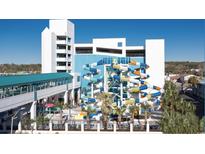 Resort waterpark featuring slides, pools, and Gathering-friendly attractions, enhanced by lush landscaping and a clear blue sky at 1501 S Ocean Blvd. S # 1041, Myrtle Beach, SC 29577