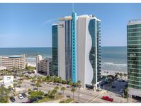 Beautiful exterior of modern condo building overlooking the beach and ocean at 107 S Ocean Blvd. # 1706, Myrtle Beach, SC 29577