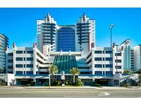 Stunning oceanfront resort featuring direct beach access, on-site parking, and modern architecture at 2007 S Ocean Blvd. # 1106, Myrtle Beach, SC 29577