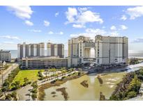 Stunning resort complex with ocean views, lush landscaping, and resort-style pool and the inter-coastal waterway at 100 N Beach Blvd. # 1806, North Myrtle Beach, SC 29582