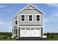 Charming two-story home with gray siding, white garage door, and well-manicured landscaping at 1088 Oak Meadow Dr., Conway, SC 29526