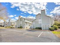 A charming exterior view shows off the well-maintained facade of this multi-unit residential building at 311 Cumberland Terrace Dr. # 7-F, Myrtle Beach, SC 29572