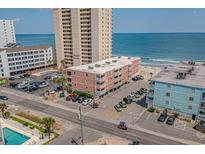 Overhead view of an oceanfront condo with parking and ocean views at 900 N Waccamaw Dr. # 301, Garden City Beach, SC 29576