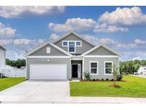 Charming single-Gathering home featuring a two-car garage and a well-maintained front yard at 108 Wagner Cir., Conway, SC 29526
