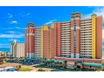 Stunning exterior view of a high-rise condo with ocean views and well-manicured landscaping at 2801 S Ocean Blvd. # 1438, North Myrtle Beach, SC 29582