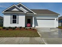 Charming single-story home with a two-car garage, manicured lawn and available sign at 8628 Farrier Dr., Myrtle Beach, SC 29588