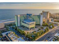 Beautiful aerial view of a colorful hotel on the beach with an ocean view at sunrise at 1105 S Ocean Blvd. # 724, Myrtle Beach, SC 29577