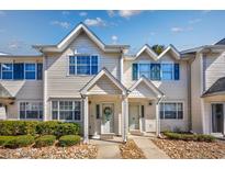 Charming townhouse featuring traditional siding, colorful shutters, and well-maintained landscaping at 701 1St Ave. S # 32C, North Myrtle Beach, SC 29582