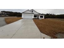 New construction of a white single-Gathering home featuring an attached two car garage at Tbb 8 Saint John Rd., Galivants Ferry, SC 29544