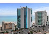 Oceans One resort view showcasing the building's architectural design against the backdrop of a sunny beach at 107 S Ocean Blvd. # 2106, Myrtle Beach, SC 29577