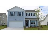 Charming two-story home with a two-car garage, blue siding, black shutters, and a well-maintained lawn at 1111 Black Lake Way, Conway, SC 29526