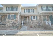 Charming townhouse exterior with brick facade, light siding, and inviting entryway at 210 25Th Ave. S # 26, Myrtle Beach, SC 29577