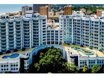 Condominium complex with pools, trees, and ocean views in a high rise building at 215 77Th Ave. N # 702, Myrtle Beach, SC 29572