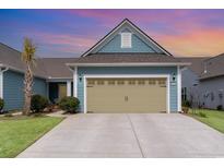 Charming home featuring a spacious two-car garage and driveway at 5834 Cremona Dr., Myrtle Beach, SC 29577