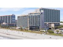 Beachfront resort featuring multiple floors, balconies, and beautiful views of the ocean and beach at 201 74Th Ave. N # 1802, Myrtle Beach, SC 29572