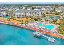Beautiful waterfront condo with a swimming pool, dock and manicured landscaping creating a luxurious and tranquil atmosphere at 2180 Waterview Dr. # 513, North Myrtle Beach, SC 29582