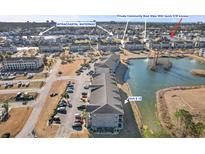 Aerial view of a waterfront community with Intracoastal Waterway access and private boat slips at 4503 W Harbour Ct. # S-12, Little River, SC 29566
