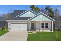 Charming single-Gathering home with a two-car garage and craftsman-style details at 2024 Copper Creek Loop, Longs, SC 29568