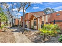 Attractive townhome with neutral tones, charming architecture and landscaped grounds at 614 14Th Ave. S # 132, Surfside Beach, SC 29575