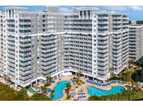 Stunning oceanfront resort with multiple pools, hot tubs, sun decks, and beautifully landscaped grounds at 161 Seawatch Dr. # 410, Myrtle Beach, SC 29572