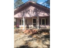 Charming single-Gathering home with a covered front porch, offering a welcoming entrance and curb appeal at 1820 S 9Th Ave., Conway, SC 29526