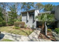 Charming two-story home with landscaped yard and inviting entryway at 358 Salt Marsh Circle # 10-A, Pawleys Island, SC 29585