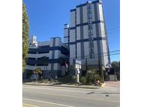 Modern condo building with sleek design, well-maintained landscaping and street view at 5308 N Ocean Blvd. # 503, Myrtle Beach, SC 29577