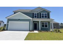 Charming two-story home with a well-maintained lawn and a two-car garage at 8076 Bear Claw Ct., Conway, SC 29526