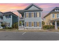 Charming two-story home with a double porch and appealing beach style architecture at 1423 Peterson St., Myrtle Beach, SC 29577