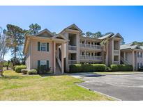 Inviting multi-level condo complex with manicured landscaping and ample parking at 366 Pinehurst Ln. # 13E, Pawleys Island, SC 29585