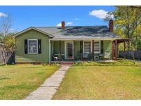 Charming single-story home with a cozy front porch and well-maintained lawn at 1502 Mckeithan St., Conway, SC 29526