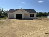 New construction featuring a 1-story home with attached two-car garage at 1506 Hardwick Rd., Conway, SC 29526