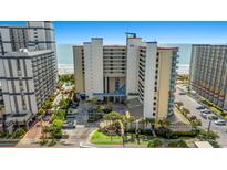 Stunning high-rise resort with ocean views, lush landscaping, and convenient parking, ideal for vacation living at 5300 N Ocean Blvd. # 320, Myrtle Beach, SC 29577