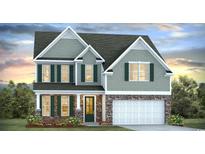 Charming two-story home featuring stone accents, green shutters, and a pristine two-car garage at 822 Belle Dr., North Myrtle Beach, SC 29582