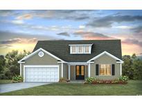 Charming single-story home with a two-car garage, neutral siding and a neatly manicured front lawn at 8956 Chesterfield Dr., Calabash, NC 28467