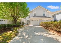Charming two-story home featuring a two-car garage and a spacious driveway at 323 14Th Ave. S # B, Surfside Beach, SC 29575