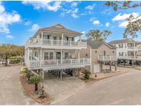 Beautiful coastal home with spacious decks, great for entertaining, on a sunny day near the water at 6001- 310 S Kings Hwy., Myrtle Beach, SC 29575