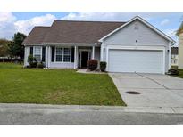 Charming single story home with manicured lawn and attached two car garage at 836 Brookline Dr., Myrtle Beach, SC 29579