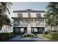 Stunning coastal home with a stilt foundation, spacious porch, and views of the ocean at 428 Vista Dr., Murrells Inlet, SC 29576