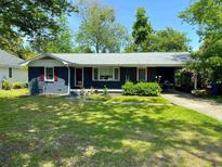 Charming single-story home with a well-maintained lawn and traditional design at 710 62Nd Ave. N, Myrtle Beach, SC 29572