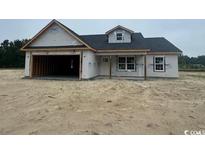 New construction home showing the front exterior elevation of the building at 384 William Nobles Rd., Aynor, SC 29511