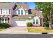 Charming townhome featuring a well-manicured lawn and an attached two-car garage at 6095 Catalina Dr. # 616, North Myrtle Beach, SC 29582