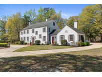 Charming traditional home with a manicured lawn, mature trees and a circular driveway at 817 Evans Rd., Marion, SC 29571