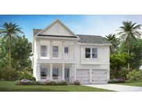 Charming two-story home featuring double front porches, a two-car garage, and lush landscaping at 8743 Baton Rouge Ave Nw, Calabash, NC 28467