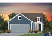 Charming single-Gathering home with a two-car garage, tidy landscaping, and beautiful exterior paint under a colorful sky at 1249 Lady Bird Way, North Myrtle Beach, SC 29582