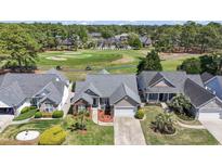 Stunning aerial view of a home on a golf course, showcasing the beautiful community and well-maintained landscaping at 136 Regency Dr., Conway, SC 29526