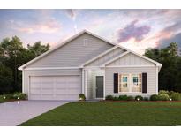 Charming single-story home featuring a two-car garage, manicured lawn, and a classic craftsman-style facade at 447 Sw Hewett Landing Dr., Supply, SC 28462